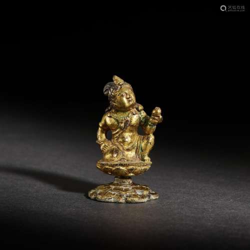 A miniature gilt-bronze figure of a bodhisattva, Tang dynast...