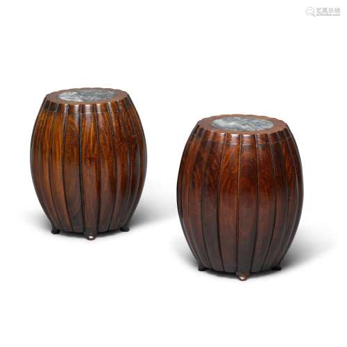 A pair of marble-inset huanghuali fluted stools, 17th - 18th...