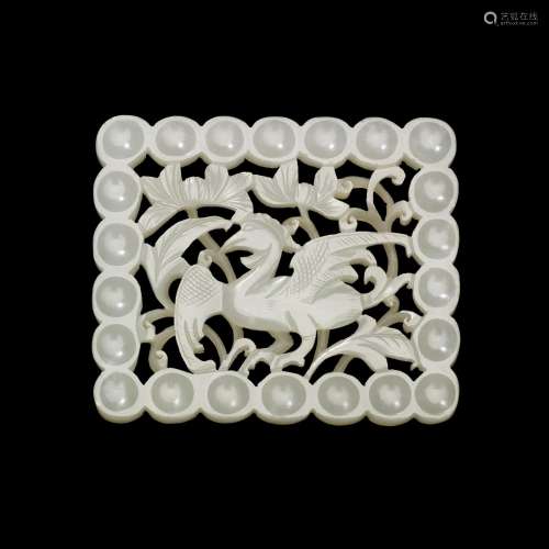 A reticulated white jade 'bird and flowers' plaque, Ming dyn...