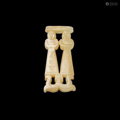 A small jade carving of twin female dancers, Eastern Zhou dy...
