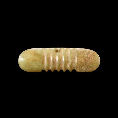 A celadon jade oblong pendant, Neolithic period, Hongshan cu...