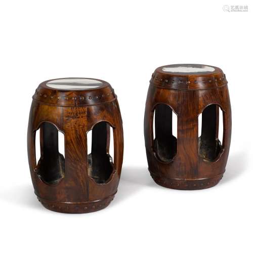 A pair of marble-inset hongmu garden stools, Late Ming dynas...