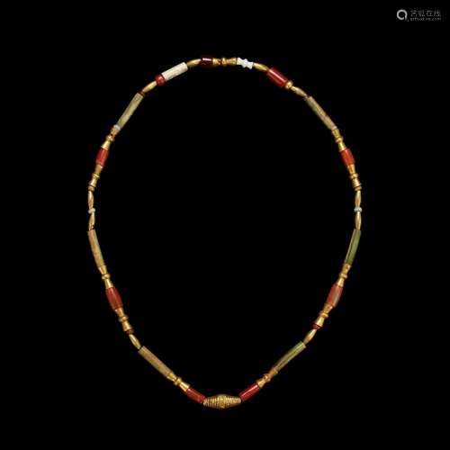 A necklace with gold, jade and carnelian beads, Dian culture...