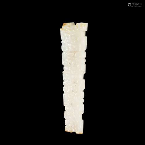 A white and russet jade long pendant, Eastern Zhou dynasty, ...