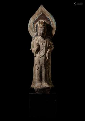 A superbly carved polychrome limestone figure of a Bodhisatt...