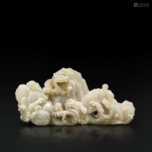 An imperial white jade 'dragon' brushrest, Qing dynasty, 18t...