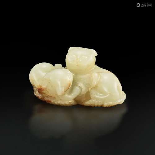 A white and russet jade 'cat' group, Qing dynasty, 18th cent...