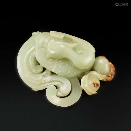 A white and russet jade 'phoenix and peach' group, Qing dyna...