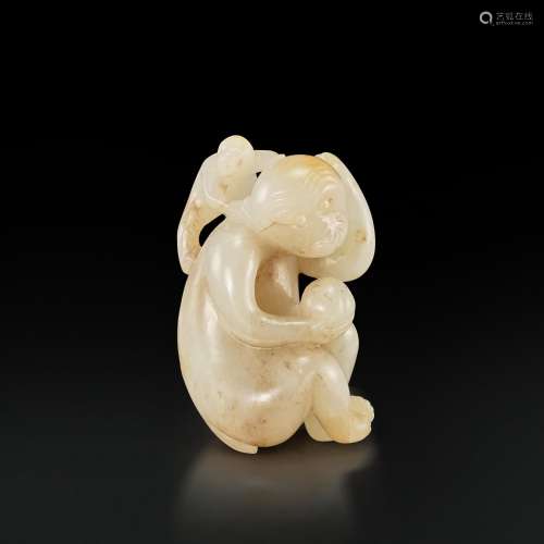 A white and russet jade figure of a monkey, Ming dynasty |  ...