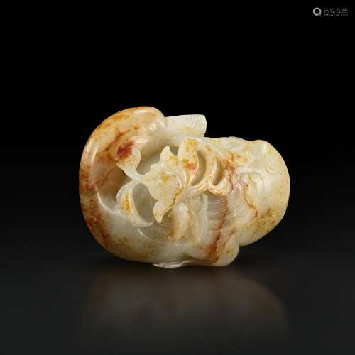 A white and russet jade 'duck and lotus' group, 17th century...