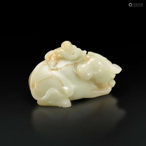 A white and russet jade 'boy and buffalo' group, Qing dynast...