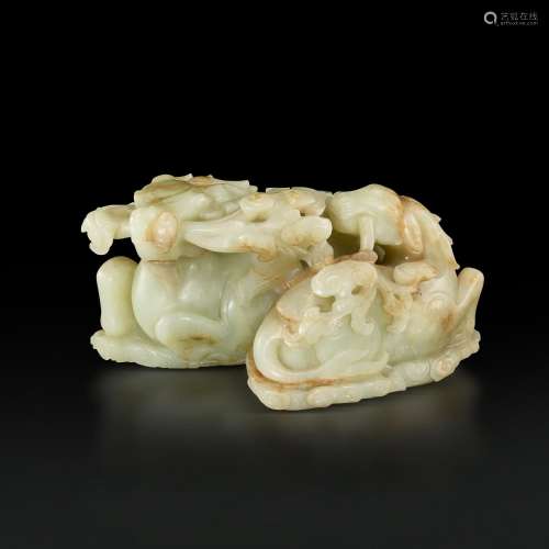A large pale celadon and russet jade 'deer and lingzhi' grou...