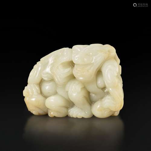 A white and russet jade 'mythical beast' group, Qing dynasty...