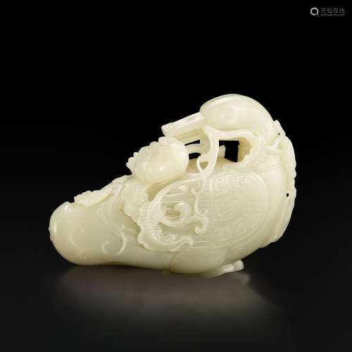 A white jade archaistic 'duck and lotus' group, Qing dynasty...