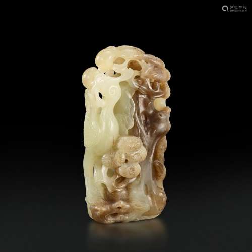A white and russet jade openwork 'bird and pine' group, Qing...