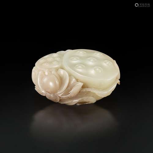 A white and brown jade 'lotus' carving, Qing dynasty, 18th c...