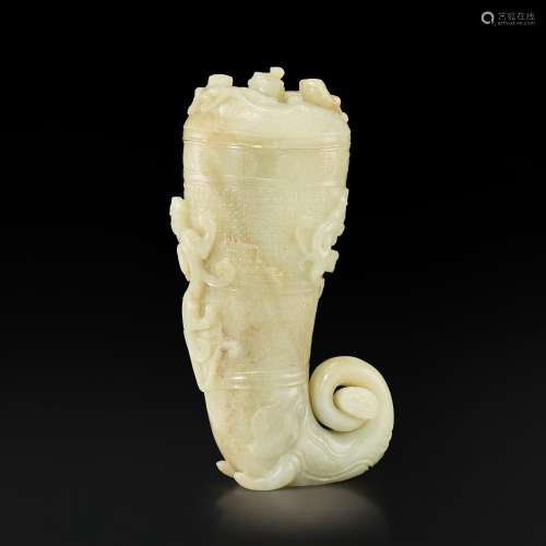 A white jade 'chilong and elephant' rhyton and cover, Qing d...