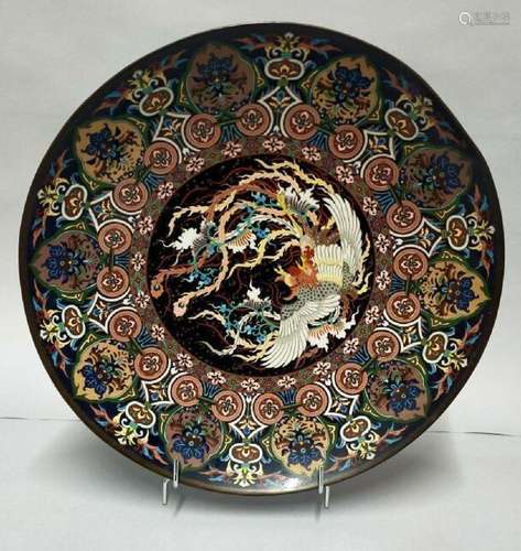 JAPON<br />
Plat en cloisonné<br />
Daim . : 37 cm<br />
(ac...