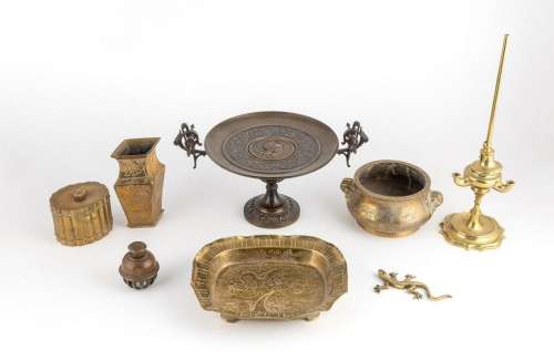 A collection of assorted brass wares,