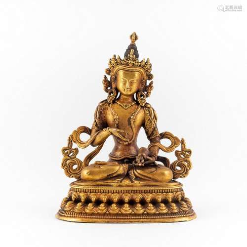 A Tibetan gilt seated figure of Avalokitesvara, 4 x 3 in. (1...