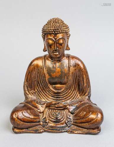 A gilt figure of the seated Buddha. 8 1/4 x 7 in. (20.96 x 1...