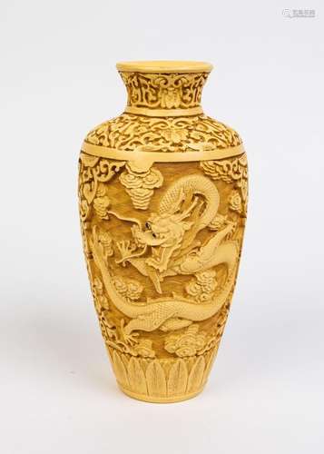 A Chinese yellow lacquered baluster form vase, 9 1/2 in. (24...