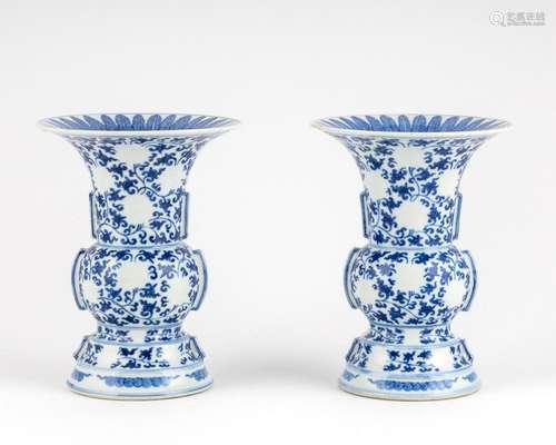 A pair of Chinese blue and white vases of trumpet form, 8 1/...