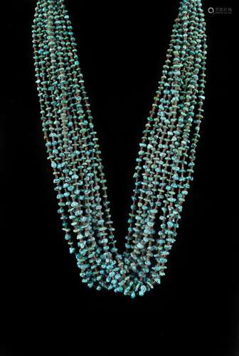 A turquoise Heishe beaded cluster necklace. 31 in. (79 cm) l...