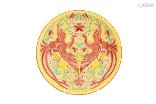 A Chinese porcelain Fenghuang dish, painted amongst blossomi...