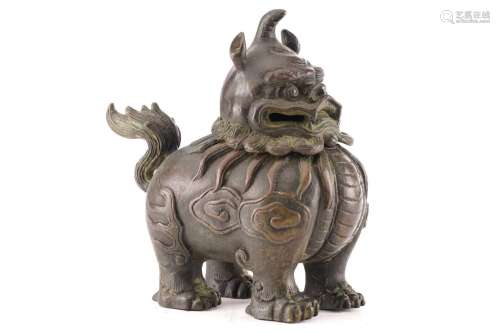 A Chinese bronze censor in the form of a Pixiu, with scrolli...