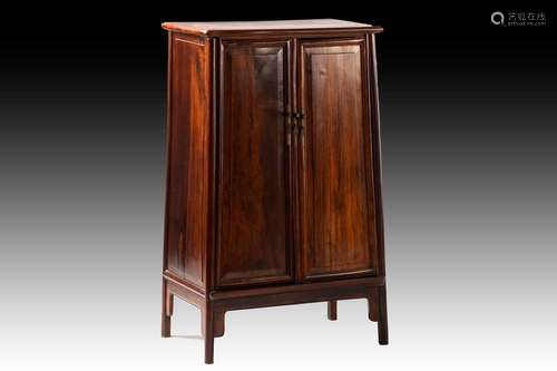 A Chinese Huanghuali tapering two-door cabinet with radiused...