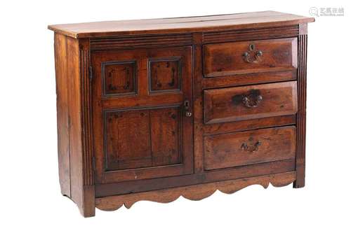 An 18th century and later oak and elm dresser with a planked...