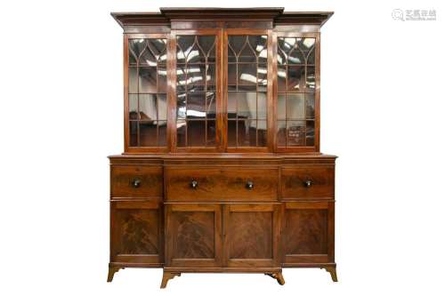 A large early 19th century figured mahogany break-front secr...