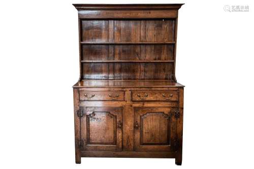 An 18th-century oak dresser base and rack, probably mid/late...