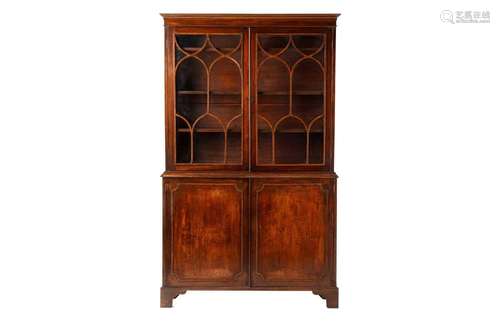 A George III and later mahogany bookcase cabinet, the moulde...