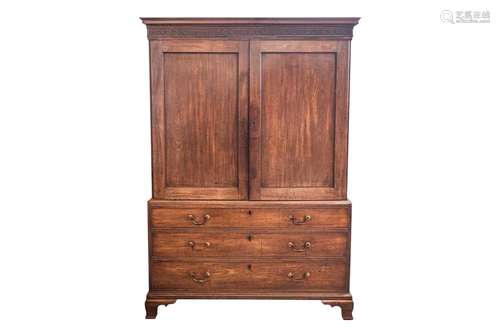 A George III mahogany linen press, the two-door upper sectio...