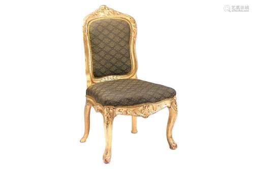 A George III carved mahogany (?) and gilt gesso slide chair ...