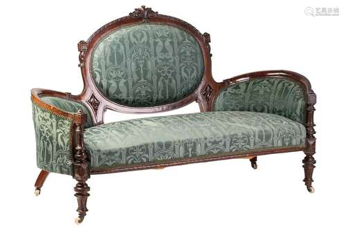 A late Victorian simulated rosewood cameo back sofa, with ca...