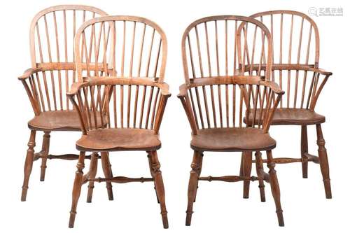 A pair of 19th-century hoop-back Windsor open armchairs, wit...