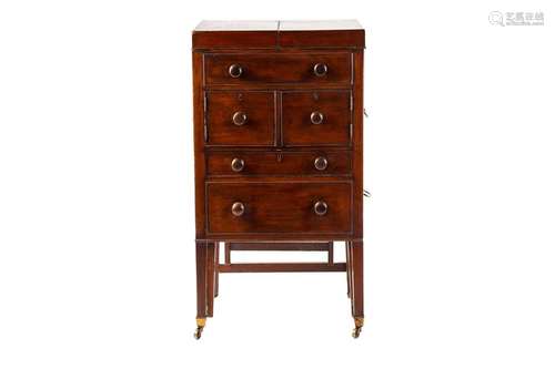 An early 19th century mahogany wash stand, the twin flap top...