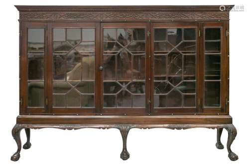 A large George III style astragal glazed bookcase with denti...
