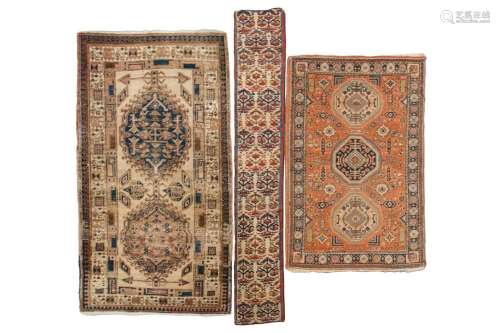 An old possibly North West Persian tribal rug with two lozen...