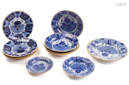 Five 18th century Dutch Delft plates, depciting a figure on ...