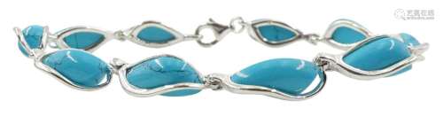 Silver turquoise crossover link bracelet