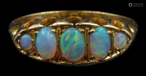 Early 20th century 18ct gold graduating opal ring