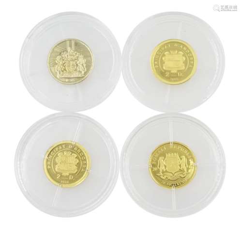 Four gold `World`s Smallest Coins`