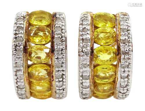 Pair of 10ct gold oval yellow sapphire half hoop earrings
