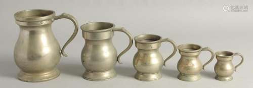 A SET OF FIVE EARLY BELL METAL MEASURES. 2.5, TO 6.5. Bears ...