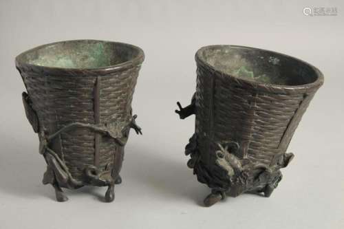 A PAIR OF ORIENTAL FRENCH BRONZE BASKETS with leaves and loc...