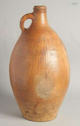 A VERY LARGE EARLY STONEWARE FLAGON. 18in high.